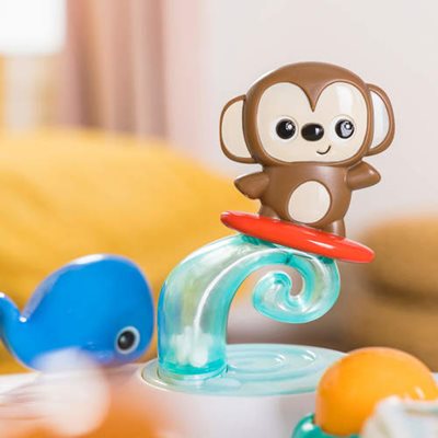 מרכז פעילות אורקולי 2 ב-1 מסתובב ושולחן הפעלות בסגנון טרופי bright starts